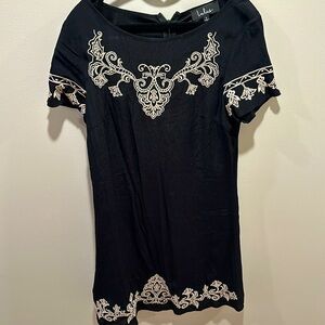 Black dress with cream design